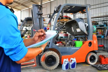 mechanic-is-checking-quality-maintenance-forklift-energy-fuel-concept